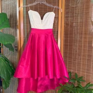 Small white and pink asymmetrical dress. The top is lace.